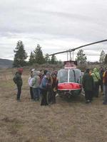 FWR students with helicopter used for big horn sheep capture