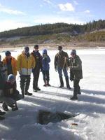 FWR students learning to set gill nets under the ice