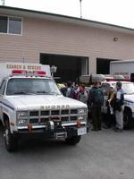 FWR students looking over search and rescue equipment