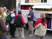 RMSAR manager Rick Laing shows students rescue equipment