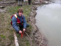 FWR student Colin Bailey setting a Gee or minnow trap