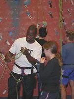 FWR students receiving climbing and repelling instruction