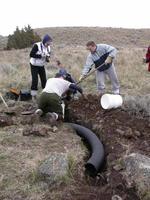 FWR students laying "big" pipe for owl burrows