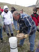 Biologist Dave Low showing FWR students a "bucket" burrow