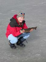 FWR student Colin Bailey setting a Gee or minnow trap